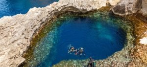underwater-cave-in-the-form-of-heart-and-divers-at-azure-window-in-gozo-malta-image-id-141789481-1422973381-xrhj